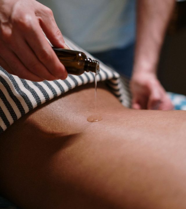 pexels photo 3998013 3998013 Experience tranquility with a soothing oil massage in a serene spa environment.